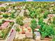 Neighborhood aerial view featuring tree-lined streets, mature landscaping, and charming homes in a desirable location at 1600 Xanthia St, Denver, CO 80220