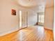 Bright living room featuring hardwood floors and a front door with natural light at 1600 Xanthia St, Denver, CO 80220