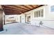 Covered patio with stained wood ceiling, fan, and decorative lighting at 12861 Royal Ct, Broomfield, CO 80020