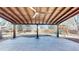 Covered patio with stained wood ceiling, fan, and decorative lighting at 12861 Royal Ct, Broomfield, CO 80020