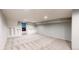 Unfinished basement area with built-in storage cubbies and neutral colored carpet at 12861 Royal Ct, Broomfield, CO 80020