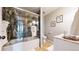 Elegant bathroom featuring a glass-enclosed shower and marble countertop at 12861 Royal Ct, Broomfield, CO 80020