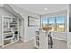 Bright office space featuring a large window and unique storage shelves at 359 Josef Cir, Fort Lupton, CO 80621