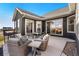 Cozy patio with outdoor seating and a view of the well-manicured backyard at 359 Josef Cir, Fort Lupton, CO 80621