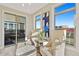 Bright sitting area offers comfortable seating, stylish decor, and nice views through large windows at 359 Josef Cir, Fort Lupton, CO 80621