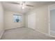 Bedroom with carpet, ceiling fan, closet, neutral paint and window at 6480 Moss Cir, Arvada, CO 80007