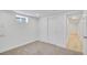 Finished basement bedroom features carpet, a closet, and a window at 7826 Joan Dr, Denver, CO 80221