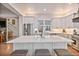 Beautiful kitchen with stainless steel appliances, island, and seating at 24273 E Fremont Dr, Aurora, CO 80016