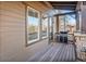 Outdoor patio features a gas grill, wood flooring, and views of the neighborhood at 24273 E Fremont Dr, Aurora, CO 80016