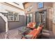 Relaxing outdoor patio with comfortable seating and a stylish table, perfect for entertaining at 24273 E Fremont Dr, Aurora, CO 80016