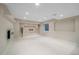 Spacious basement featuring recessed lighting, and neutral walls complementing the light hardwood floors at 6393 S Richfield St, Aurora, CO 80016