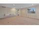 Bonus room features a wall-mounted cabinet and a large window at 6393 S Richfield St, Aurora, CO 80016