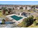 Aerial view of community pool covered for the winter and the surrounding neighborhood at 6393 S Richfield St, Aurora, CO 80016