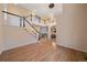 Open foyer with hardwood floors and views of the living and dining areas at 6393 S Richfield St, Aurora, CO 80016