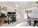 A bright office space with multiple work stations and neutral carpet at 8738 Chase Dr # 133, Arvada, CO 80003
