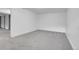Finished basement with neutral carpet and access to other rooms at 7900 W Layton Ave # 864, Littleton, CO 80123