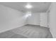 Basement area features carpeting, a window, and a door at 7900 W Layton Ave # 864, Littleton, CO 80123
