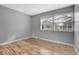 Bright bedroom featuring wood floors and a window with natural light at 7900 W Layton Ave # 864, Littleton, CO 80123