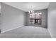Dining area featuring a large window and neutral-colored walls at 7900 W Layton Ave # 864, Littleton, CO 80123