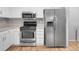 Spacious kitchen with stainless steel appliances, including refrigerator, microwave, and range at 7900 W Layton Ave # 864, Littleton, CO 80123