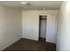 This bedroom features a closet and neutral tones throughout at 4505 Everett St, Wheat Ridge, CO 80033