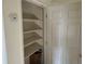 Walk in closet has built in shelving at 4505 Everett St, Wheat Ridge, CO 80033