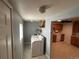 Convenient laundry room located adjacent to the kitchen at 4505 Everett St, Wheat Ridge, CO 80033