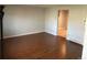 Spacious living room features hardwood floors and neutral paint at 4505 Everett St, Wheat Ridge, CO 80033