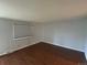Bright living room with hardwood floors and a view of the neighborhood at 4505 Everett St, Wheat Ridge, CO 80033