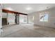 This unfinished basement has a walkout to the backyard, a window and high ceilings at 8840 Whiteclover St, Littleton, CO 80125