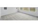 Spacious bedroom with natural light from multiple windows and plush carpeting at 8840 Whiteclover St, Littleton, CO 80125