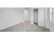 This bedroom features neutral carpet, bright white walls, and a closet at 8840 Whiteclover St, Littleton, CO 80125
