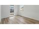 Bright bedroom with hardwood floors and large windows at 8840 Whiteclover St, Littleton, CO 80125