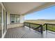 Covered deck offering panoramic views of the surrounding landscape at 8840 Whiteclover St, Littleton, CO 80125