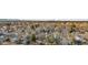 Charming neighborhood with mature trees and views of the city skyline and mountains in the distance at 3287 S Humboldt St, Englewood, CO 80113