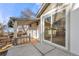Back porch and sliding glass door lead to the kitchen and dining room at 3287 S Humboldt St, Englewood, CO 80113