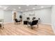Inviting finished basement living room boasts recessed lighting, wood-look flooring, and neutral paint at 3287 S Humboldt St, Englewood, CO 80113