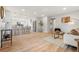 Bright and open living space seamlessly connecting to the modern kitchen area at 3287 S Humboldt St, Englewood, CO 80113