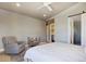 Bright bedroom featuring neutral tones, an ensuite bath and walk in closet at 3003 S Sherman St, Englewood, CO 80113