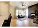 Cozy living room features hardwood floors, fireplace, large windows and comfortable furnishings at 3003 S Sherman St, Englewood, CO 80113