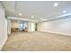 Spacious finished basement featuring recessed lighting, neutral carpet and plenty of open room for activities at 2182 S Ogden St, Denver, CO 80210