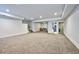 This carpeted basement has plenty of space and features an open layout at 2182 S Ogden St, Denver, CO 80210