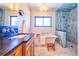 Bright bathroom featuring a soaking tub, glass shower, and granite countertop at 2182 S Ogden St, Denver, CO 80210