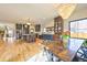Spacious open layout showcases kitchen with island, dining area, and hardwood floors at 2182 S Ogden St, Denver, CO 80210