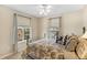 Charming bedroom with window seating and a ceiling fan at 3953 Blue Pine Cir, Highlands Ranch, CO 80126