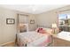 Cozy bedroom featuring a comfortable bed and plenty of natural light at 3953 Blue Pine Cir, Highlands Ranch, CO 80126