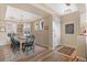 Spacious dining room featuring a rustic wooden table and chandelier at 3953 Blue Pine Cir, Highlands Ranch, CO 80126