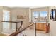 Spacious upper hallway with built-in cabinets and window seating at 3953 Blue Pine Cir, Highlands Ranch, CO 80126