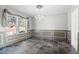 Dining room with decorative ceiling and natural light from large window at 6904 Sprucedale Pkwy, Evergreen, CO 80439