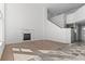 Spacious living room features a fireplace, high ceilings, and carpeted floors at 6904 Sprucedale Pkwy, Evergreen, CO 80439